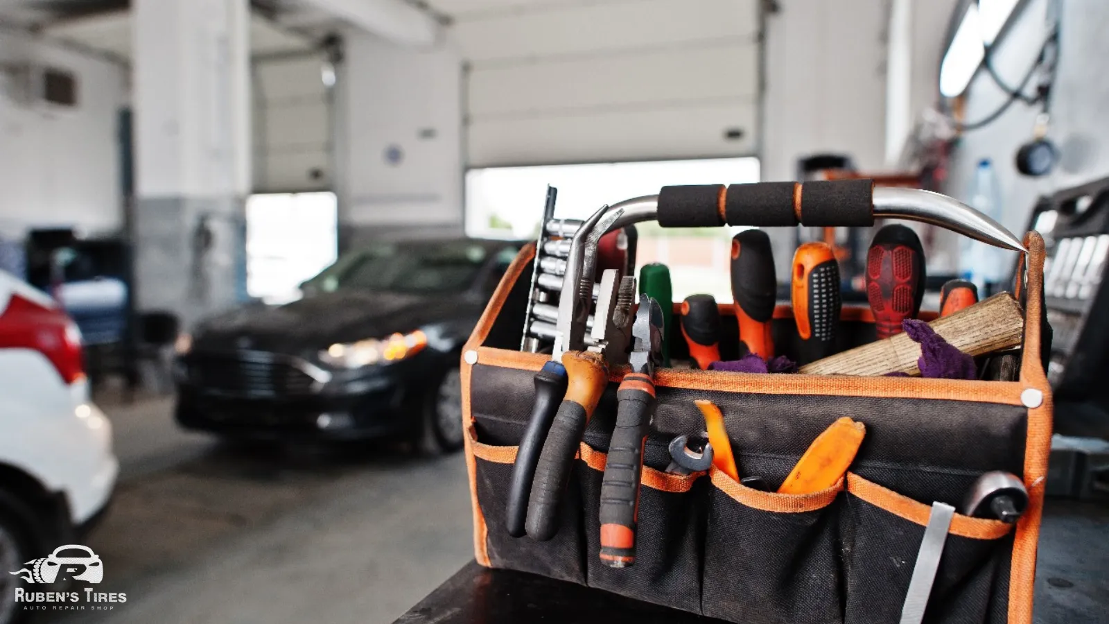 A toolbox with essential car repair tools in a professional auto repair shop in Altamonte.