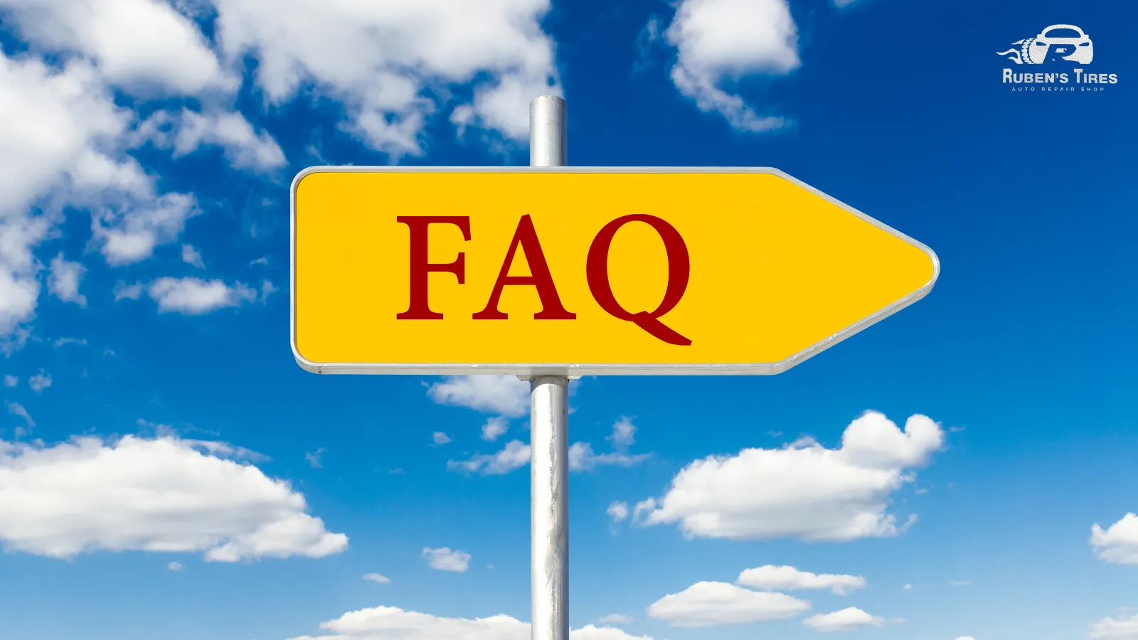 Yellow FAQ sign under a blue sky, inviting questions about brake repair at Ruben’s Tires.