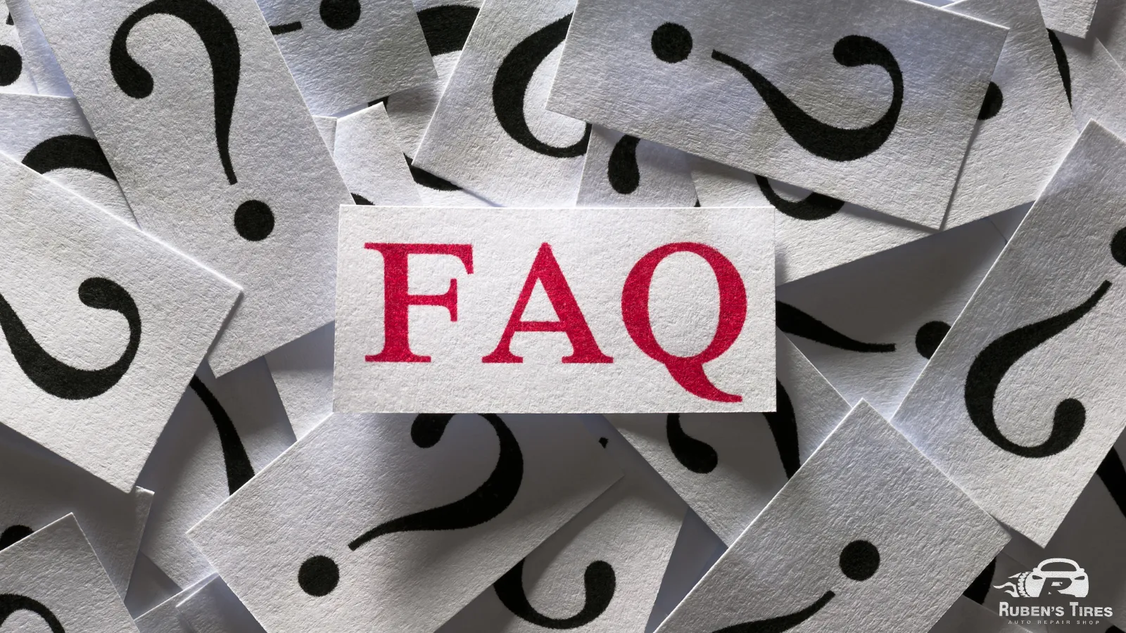 FAQ image with question marks symbolizing common queries about auto repair services at Ruben’s Tires in Altamonte.