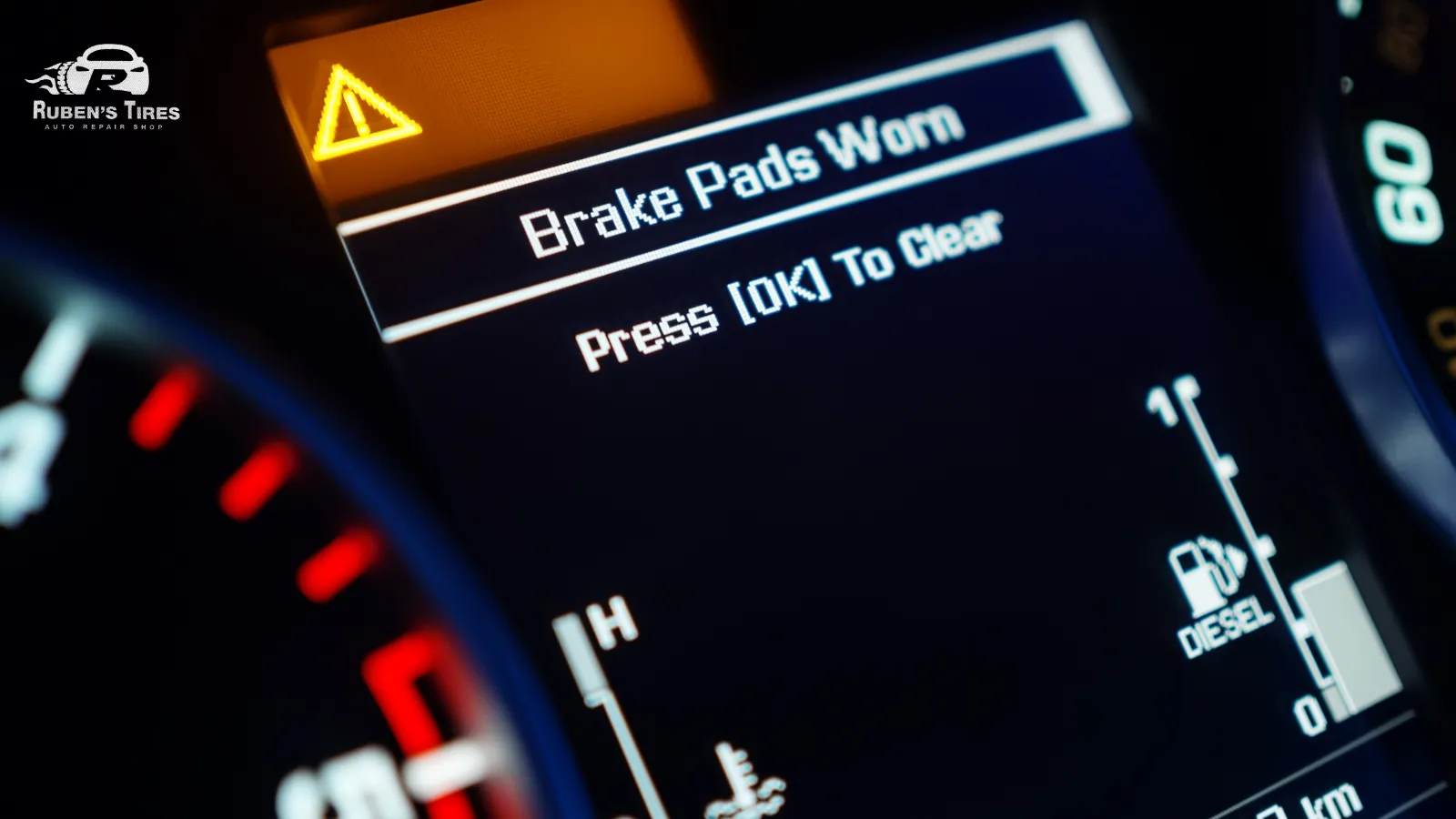 Dashboard warning light indicating worn brake pads, a service provided at Ruben’s Tires in Altamonte.